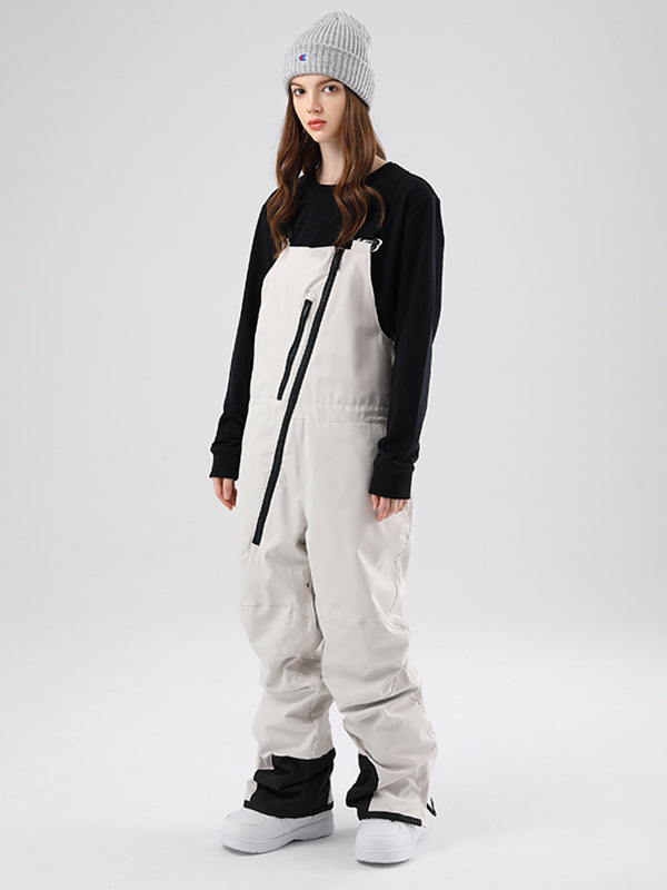 Women's Les Odettes Searipe oblique zipper winter snow pants ski bibs with adjustable straps and snow-resistant fabric.