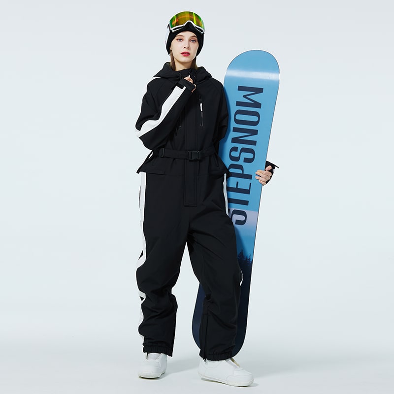 Les Odettes Women's AlpineChill SnowStorm one-piece snowsuit in bright color, with insulated design and snow-resistant fabric.