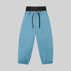 Men's ASHGREEN Winter Peak IcePro snowboarding pants by Les Odettes, shown in black with adjustable waistband and snow-resistant fabric.