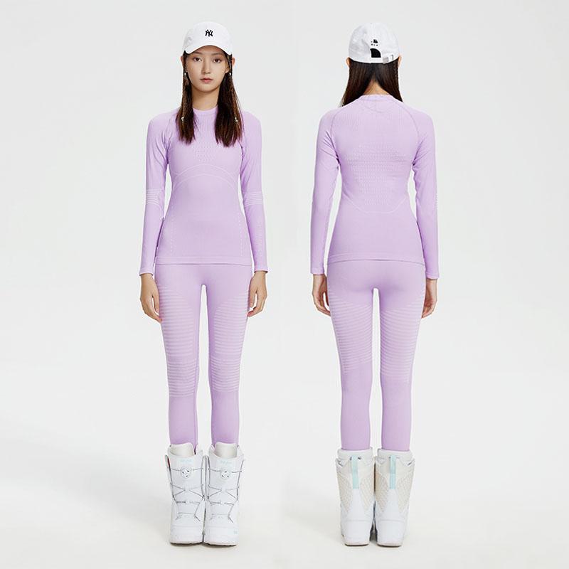 Les Odettes women's lightweight tech base layer set, high-performance functional baselayer for women, shown in a close-up image.