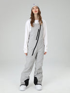 Women's Les Odettes Searipe oblique zipper winter crew snow pants ski bibs with adjustable straps and reinforced knee areas.