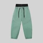 Men's ASHGREEN Winter Peak IcePro snow pants by Les Odettes, featuring waterproof fabric, insulated design, and adjustable waistband.