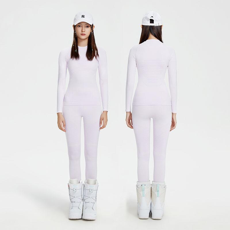 Les Odettes women's lightweight tech base layer set, showing a sleek, fitted functional base layer with breathable fabric.