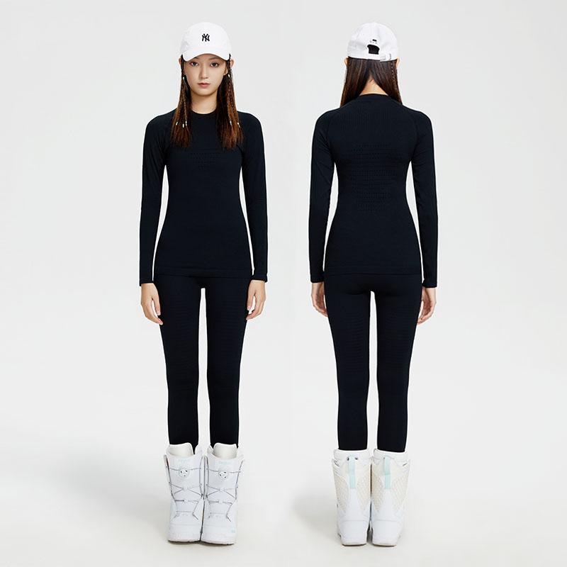 Women's lightweight tech base layer set by Les Odettes, featuring a sleek, fitted design ideal for active wear and layering.