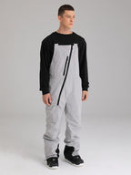 Women's Les Odettes snow pants with oblique zipper design, winter crew snow ski bibs, suitable for cold weather activities.