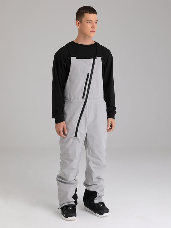 Women's Les Odettes snow pants with oblique zipper design, winter crew snow ski bibs, suitable for cold weather activities.