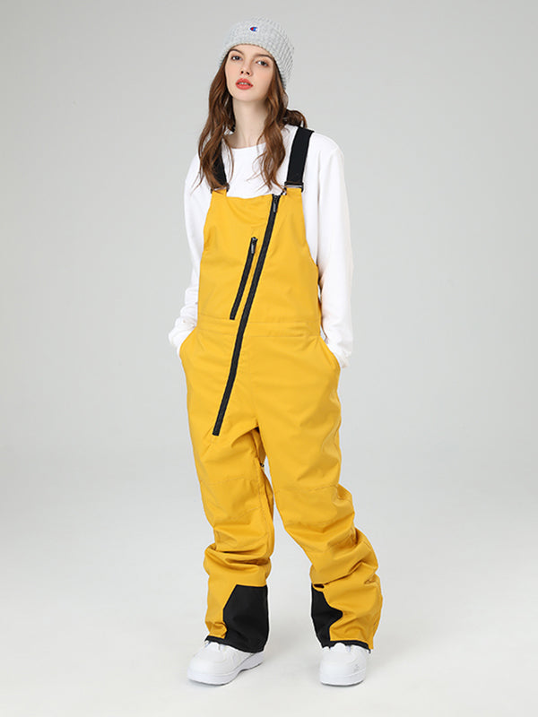 Women's Les Odettes snow pants with oblique zipper design, winter crew snow bibs for skiing, featuring a snug fit and durable fabric.