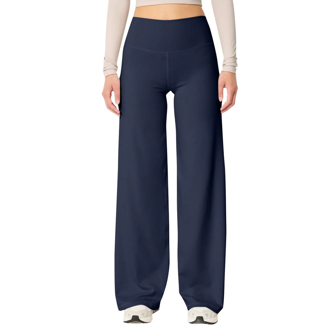 Les Odettes high waisted stretch yoga pants for women, slim fit, comfortable activewear in black, shown on a model.