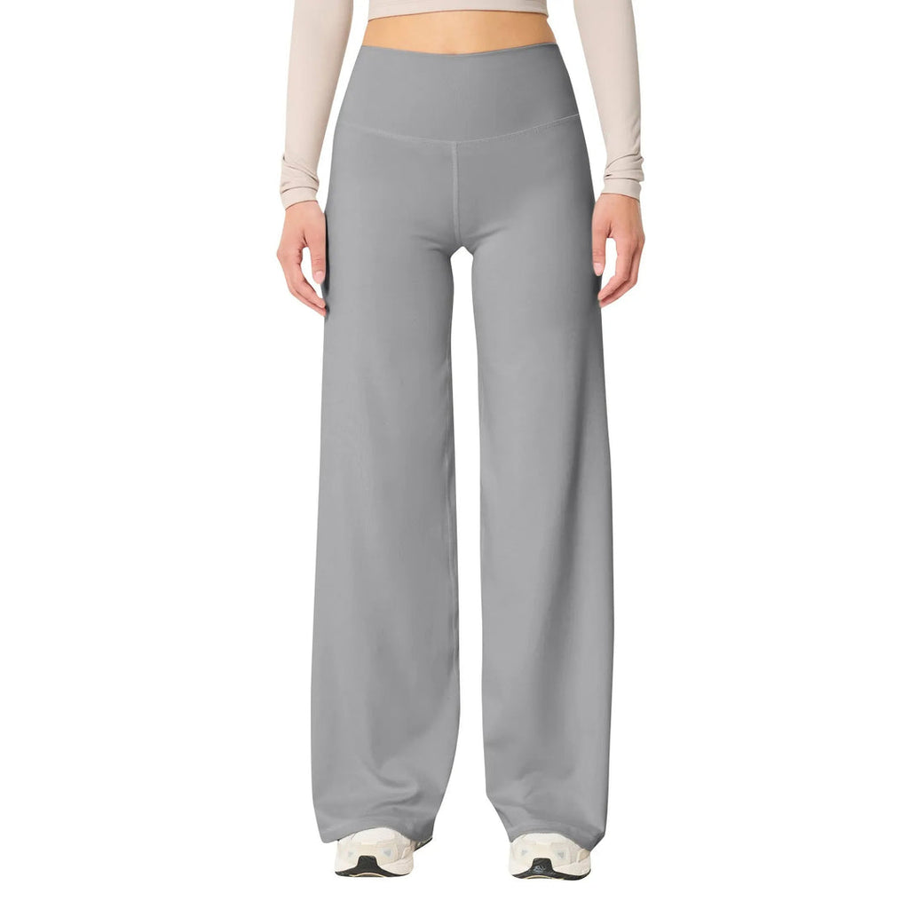 Les Odettes high waisted stretch yoga pants for women, slim fit, comfortable activewear in black on a model.