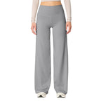 Les Odettes high waisted stretch yoga pants for women, slim fit, comfortable activewear in black on a model.