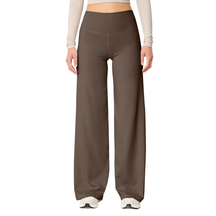 Les Odettes high waisted stretch yoga pants for women, slim fit, in black, featuring a comfortable waistband and sleek design.