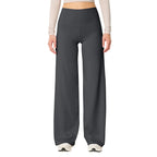 Les Odettes high waisted stretch yoga pants for women in slim fit, showing the black leggings on a model during exercise.