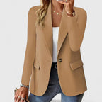 Les Odettes Grace™ elegant blazer with tailored fit and classic design, shown on a model in a professional setting.