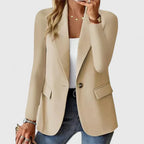 Elegant Les Odettes Grace™ blazer in black, tailored fit with lapel collar and stylish design, perfect for professional or casual wear.