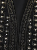Les Odettes Celestia™ boho vest with sequin pattern, featuring vibrant colors and flowy fabric, perfect for casual and festival wear.