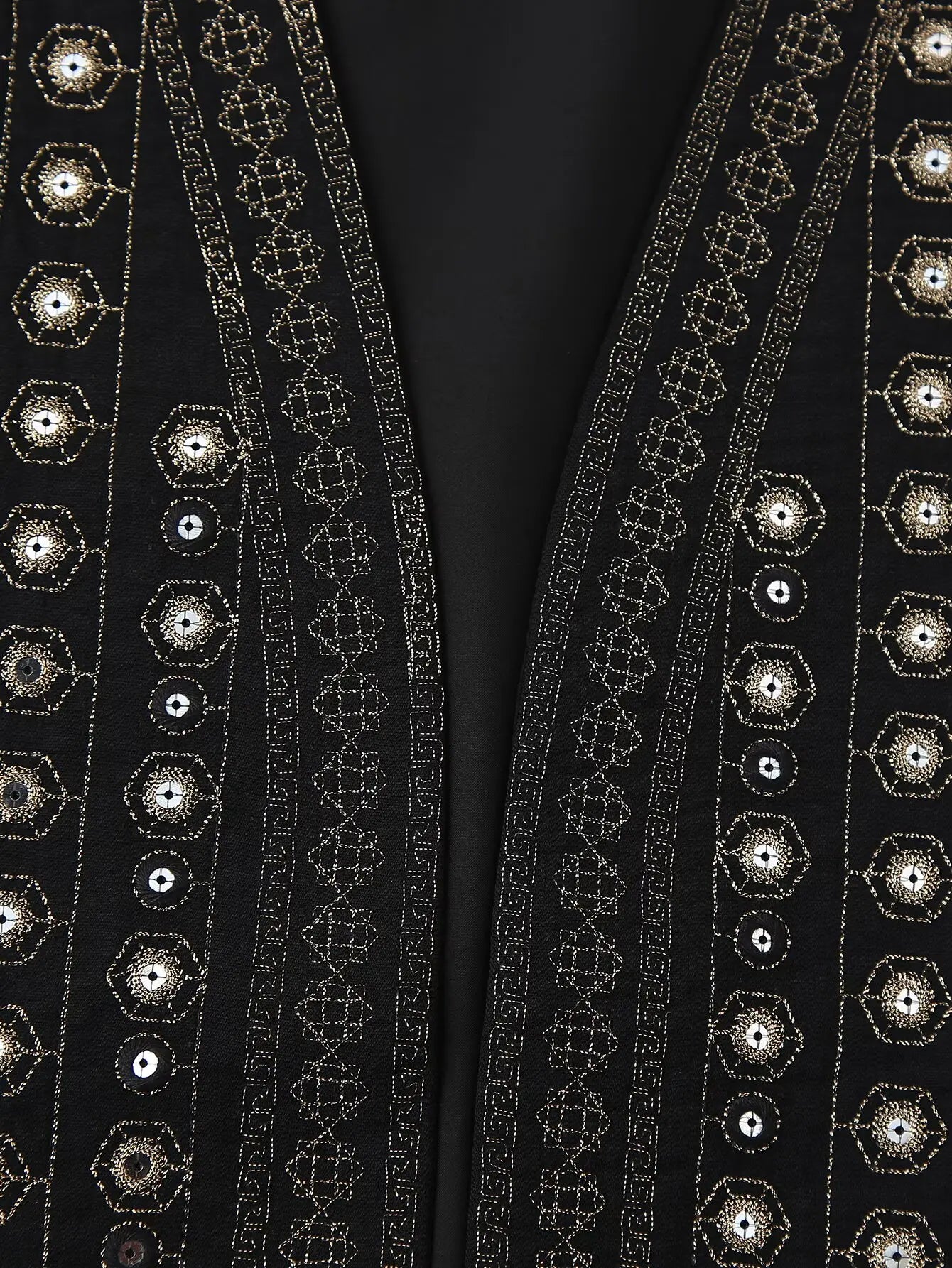 Les Odettes Celestia™ boho vest with sequin pattern, featuring vibrant colors and flowy fabric, perfect for casual and festival wear.
