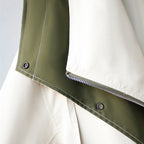 Les Odettes Aurelia™ windbreaker jacket in lightweight, water-resistant fabric, shown in a sleek, modern design.