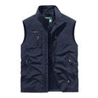Men’s water-resistant insulated bodywarmer by Les Odettes, outdoor utility vest in black with zipper front and side pockets.