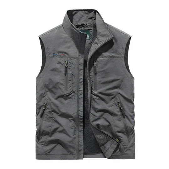 Men’s water-resistant insulated bodywarmer vest by Les Odettes, featuring a sleek outdoor utility design, shown on a model.