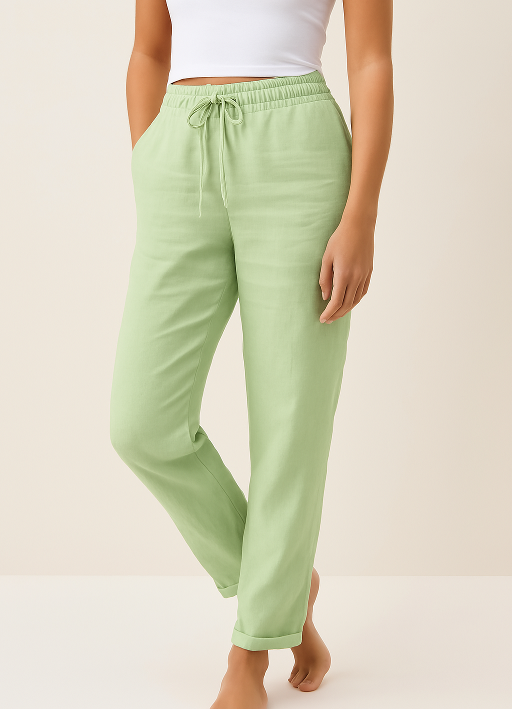 Women’s linen blend trousers by Les Odettes featuring a regular fit and breathable fabric, shown on a model.