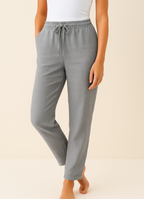 Women’s linen blend trousers by Les Odettes featuring a regular fit and breathable fabric, shown in a neutral color.