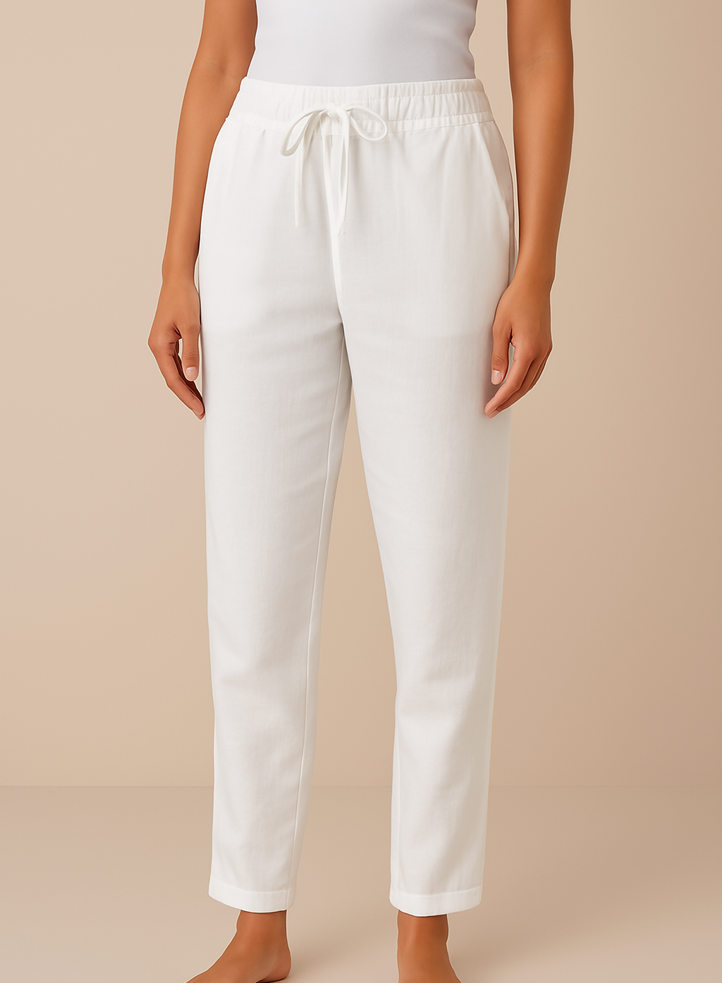 Women’s linen blend trousers by Les Odettes, regular fit with breathable fabric, shown in a stylish, relaxed fit on a model.