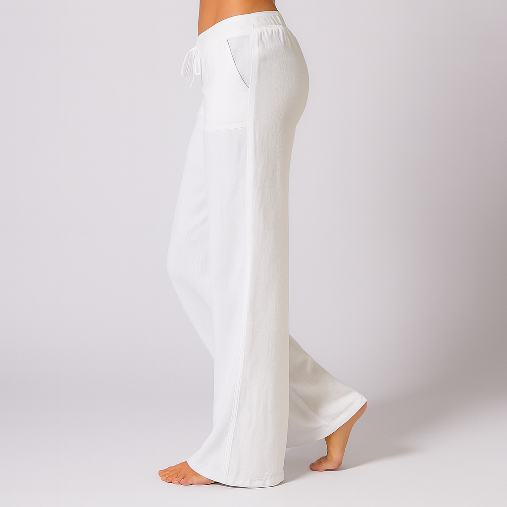 Women’s linen blend loose fit trousers by Les Odettes with an adjustable drawstring, shown in a relaxed, comfortable fit.