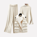 Les Odettes women's three-piece outfit set featuring a turtleneck top, trousers, and a padded vest, displayed on a mannequin.