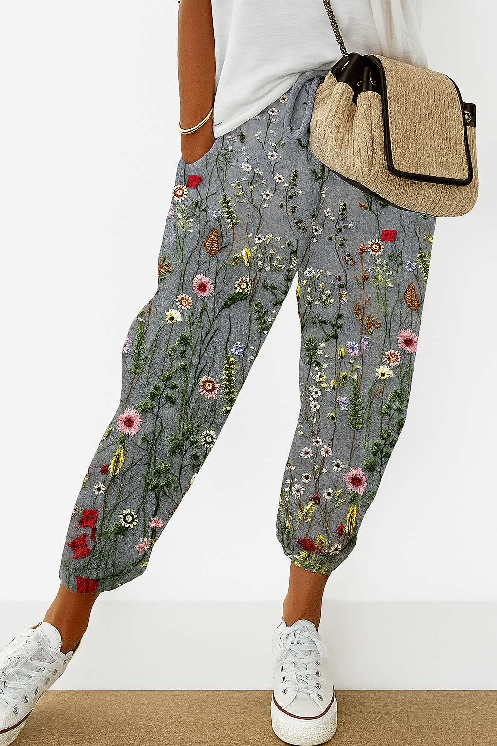 Women’s printed loose fit trousers with elastic waistband by Les Odettes, showing the relaxed fit and floral print fabric.
