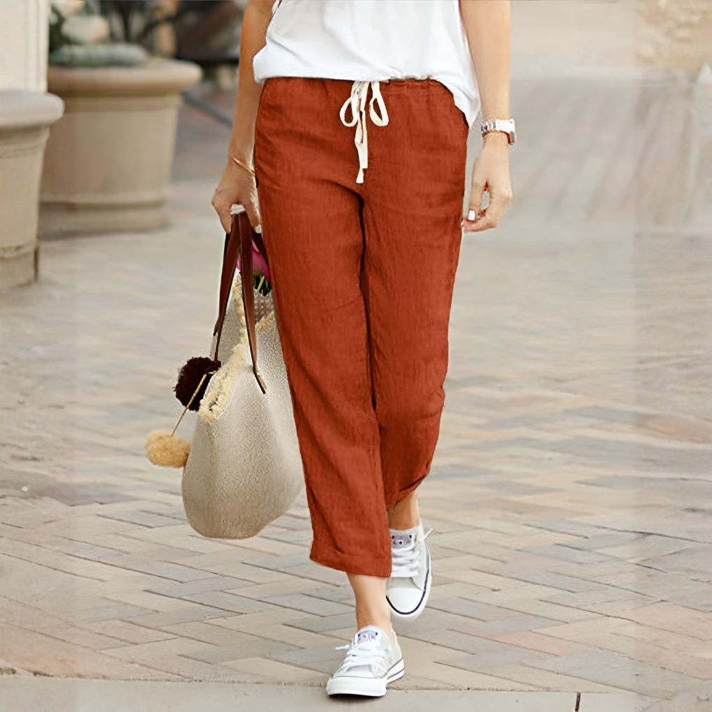 Women’s straight leg trousers with elastic waist and lightweight fabric by Les Odettes, shown in a neutral color.