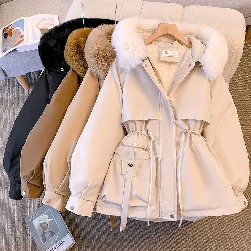 Les Odettes Odette Luxe Fur-Trimmed Winter Coat for women with a warm hood, oversized fit, and faux fur collar.