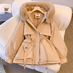 Les Odettes Odette Luxe Fur-Trimmed Winter Coat for women, cozy oversized jacket with hood and warm fur collar in winter 2023 style.