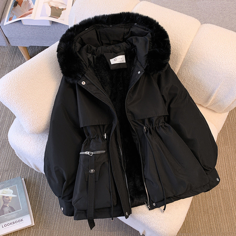 Les Odettes Odette Luxe fur-trimmed winter coat for women, featuring a hood, warm cotton material, and oversized fit.