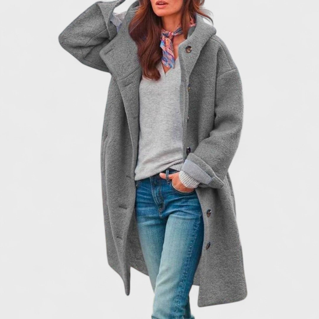 Les Odettes Margie™ Sleek City Jacket displayed on a model, featuring a modern, fitted design in a neutral color.