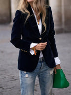 Elegant Les Odettes Carole™ velvet blazer with tailored fit and chic lapel, showcased on a hanger.