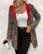 Les Odettes Aleah™ reversible coat with stylish leopard print, showcasing a cozy, fashionable outerwear piece with versatile design.