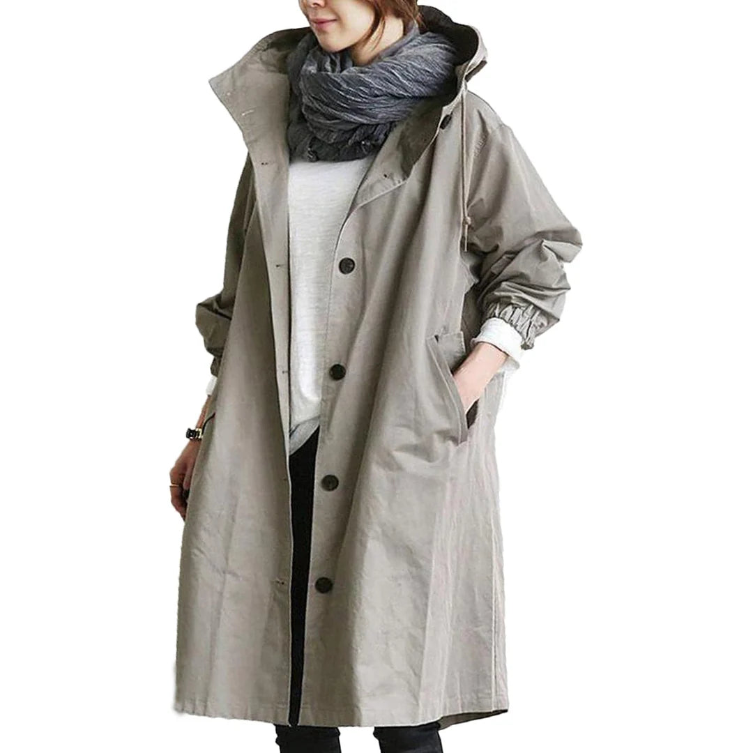 Gray women's waterproof raincoat with hood from Les Odettes, lightweight design perfect for rainy days.