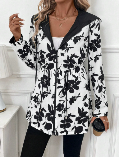 Les Odettes Aleah™ reversible coat featuring a stylish leopard print, shown with both solid and leopard sides visible.