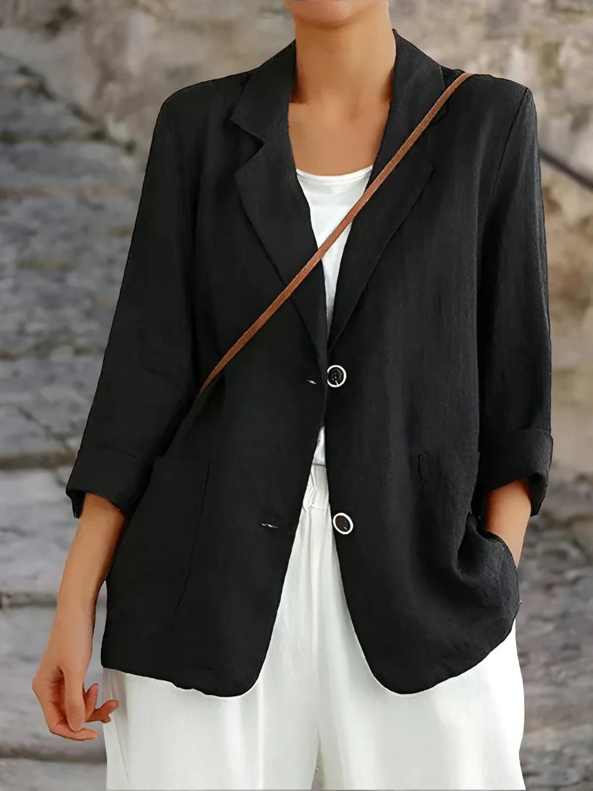 Les Odettes Juniper women's double-breasted tailored blazer, navy color, fitted style with lapel collar and button closure.