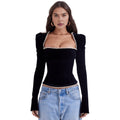 Black velvet women's corset top with puff sleeves and structured fit, stylish and elegant from Les Odettes.