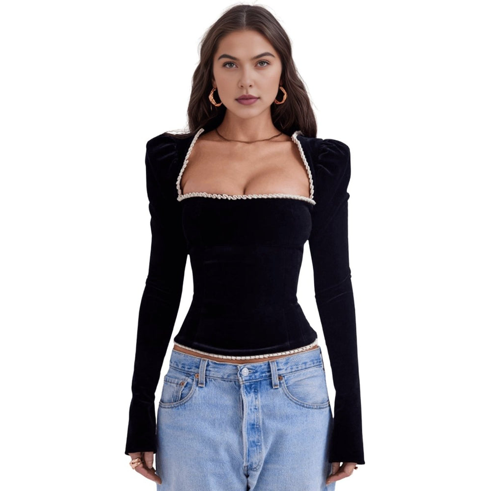 Black velvet women's corset top with puff sleeves and structured fit, stylish and elegant from Les Odettes.