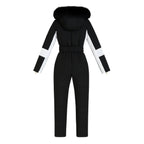 Les Odettes Dolly Glamour Ski Suit Monosuit in black and white with fur hood, belted design, suitable for winter outdoor activities.