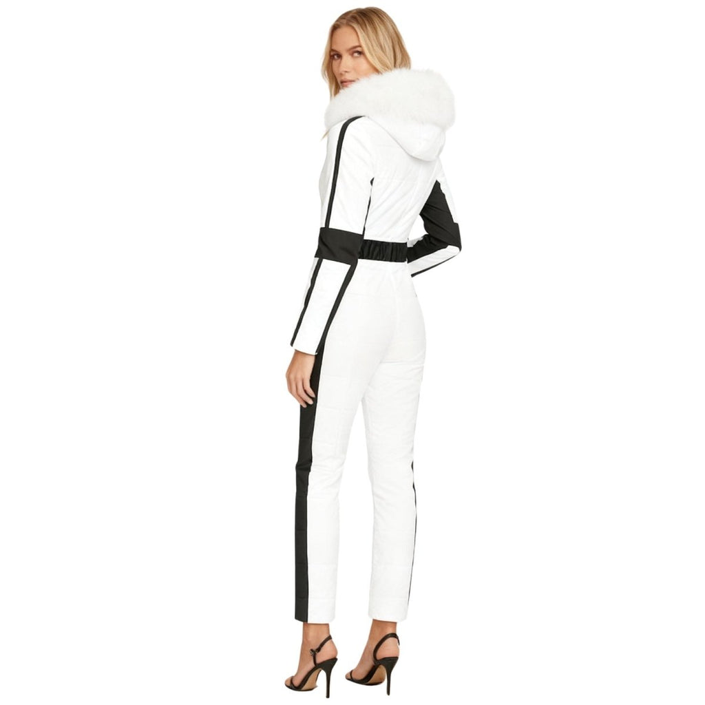 Les Odettes Dolly ski suit for women, white one-piece snow suit with fur-lined hood, back view, stylish winter outerwear.