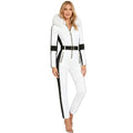 White women's one-piece ski suit by Les Odettes with fur-lined hood, waterproof and stretchy for winter snowboarding and skiing.