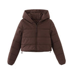 Women’s brown cropped puffer jacket by Les Odettes, lightweight nylon insulated jacket with front view and quilted design.