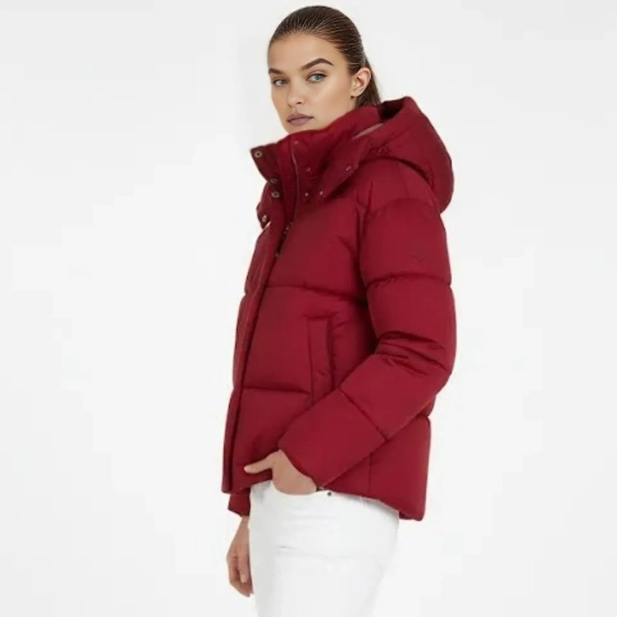 Red women's puffer jacket by Les Odettes, showcasing a slim fit design and quilted texture, front view.