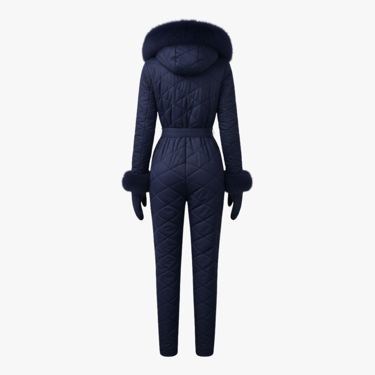 Les Odettes women's navy quilted ski suit shown from the back, featuring a padded, insulated design for winter skiing.