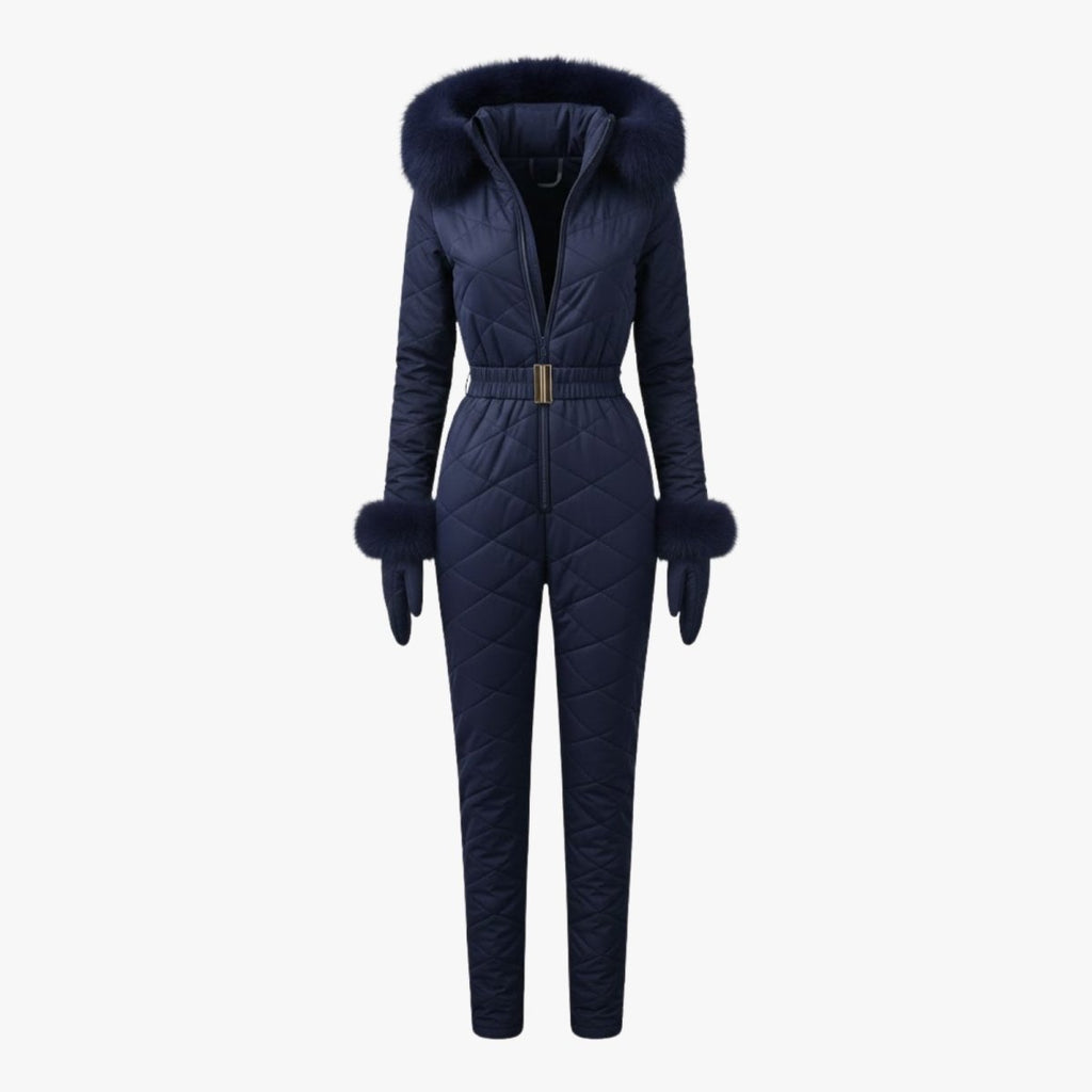 Navy women's quilted ski suit by Les Odettes, front view showing insulated, stylish winter ski jumpsuit with a fitted design.