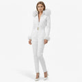 White quilted women’s ski suit by Les Odettes, front view showcasing the stylish, insulated outerwear for winter sports.