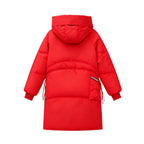 Red women’s puffer jacket by Les Odettes, featuring a long, quilted design with a high collar and cozy winter style.